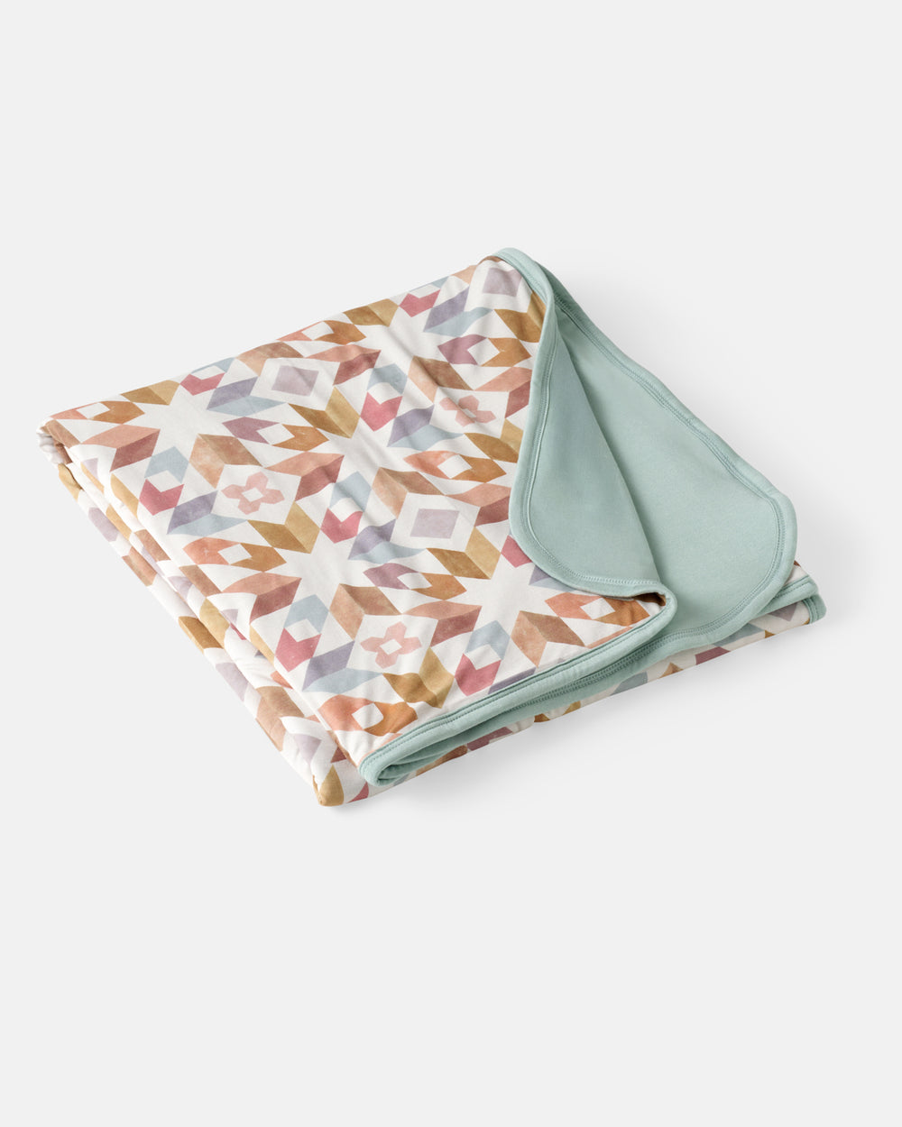 Flat lay of the Kaleidoscope Dreams Oversized Cloud Blanket®