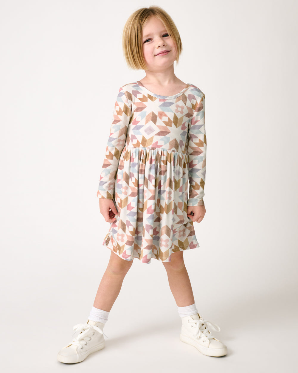 Standing girl wearing the Kaleidoscope Dreams Ribbed Skater Dress