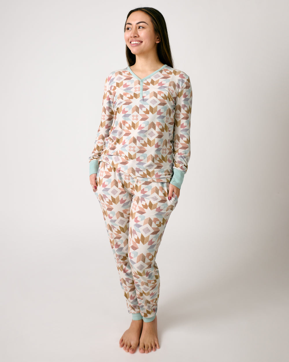 Standing woman wearing the Kaleidoscope Dreams Ribbed Women's Pajama Pants and Top