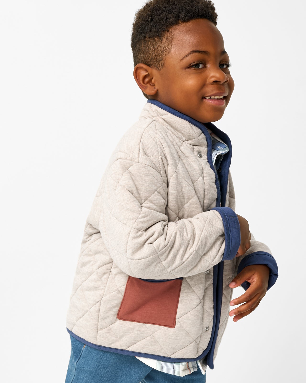 Boy wearing the Linen Heather Quilted Barn Jacket