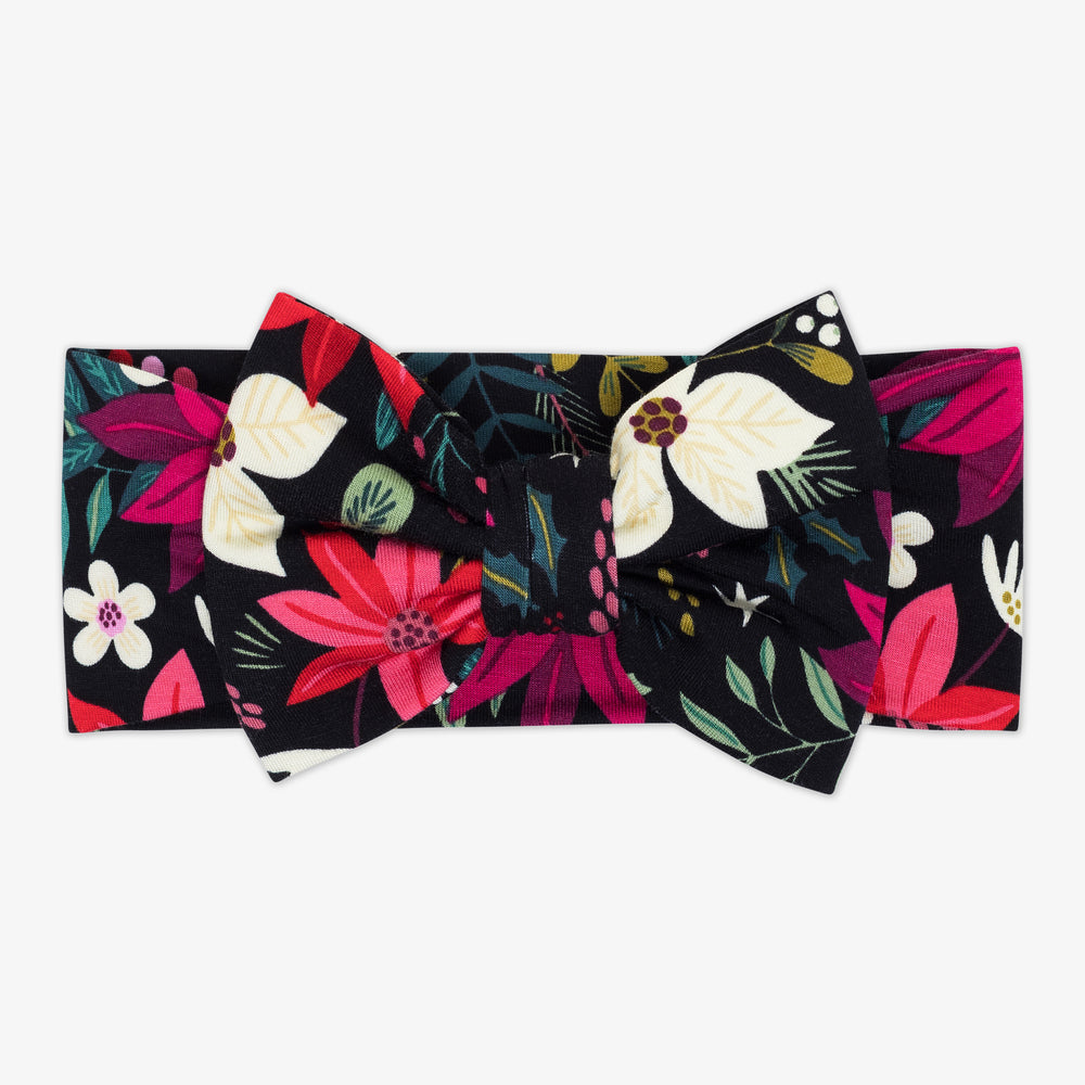 Flat lay image of the Berry Merry Luxe Bow Headband