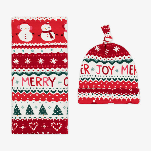 Flat lay image of a Festive Fair Isle Swaddle & Hat Set