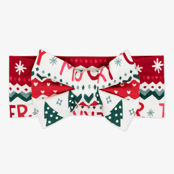 Flat lay image of a Festive Fair Isle Luxe Bow Headband