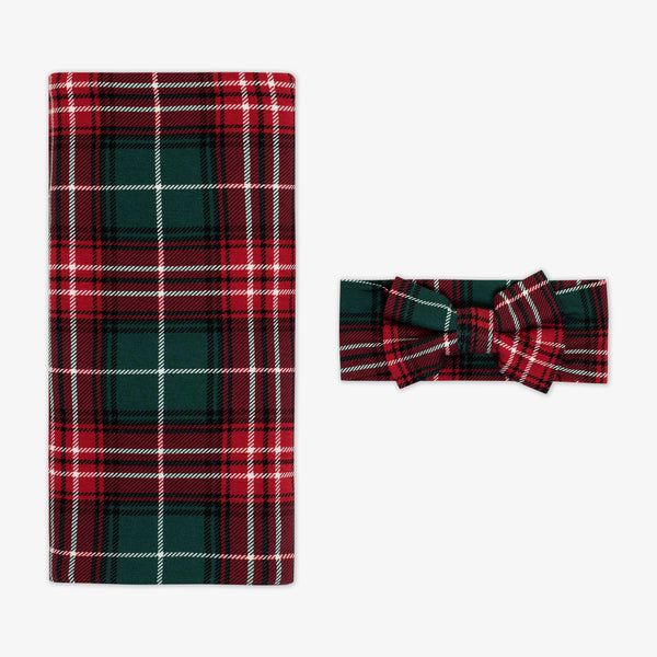 Flat lay image of a Fireside Plaid Swaddle & Luxe Bow Headband Set