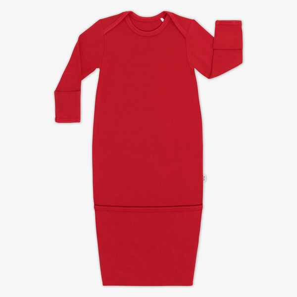 Flat lay image of the Holiday Red Infant Gown