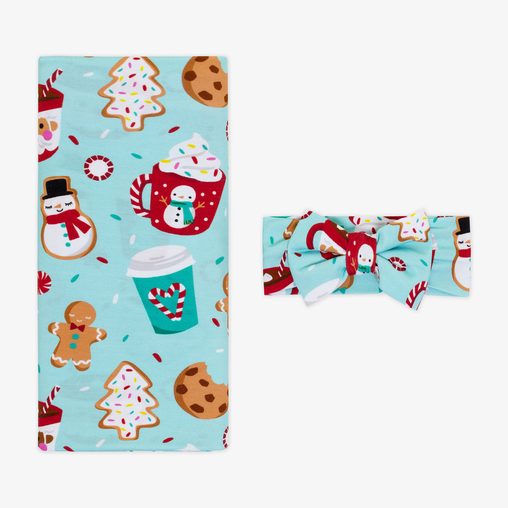 Flat lay image of a Peppermint Mocha Swaddle & Luxe Bow Headband Set