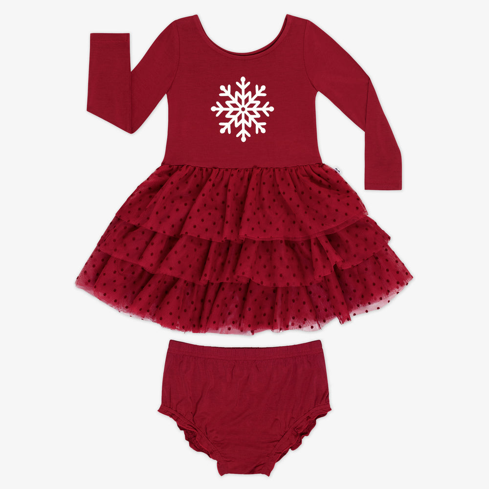 Flat lay image of a Snowflake Tiered Tutu Dress with Bloomer