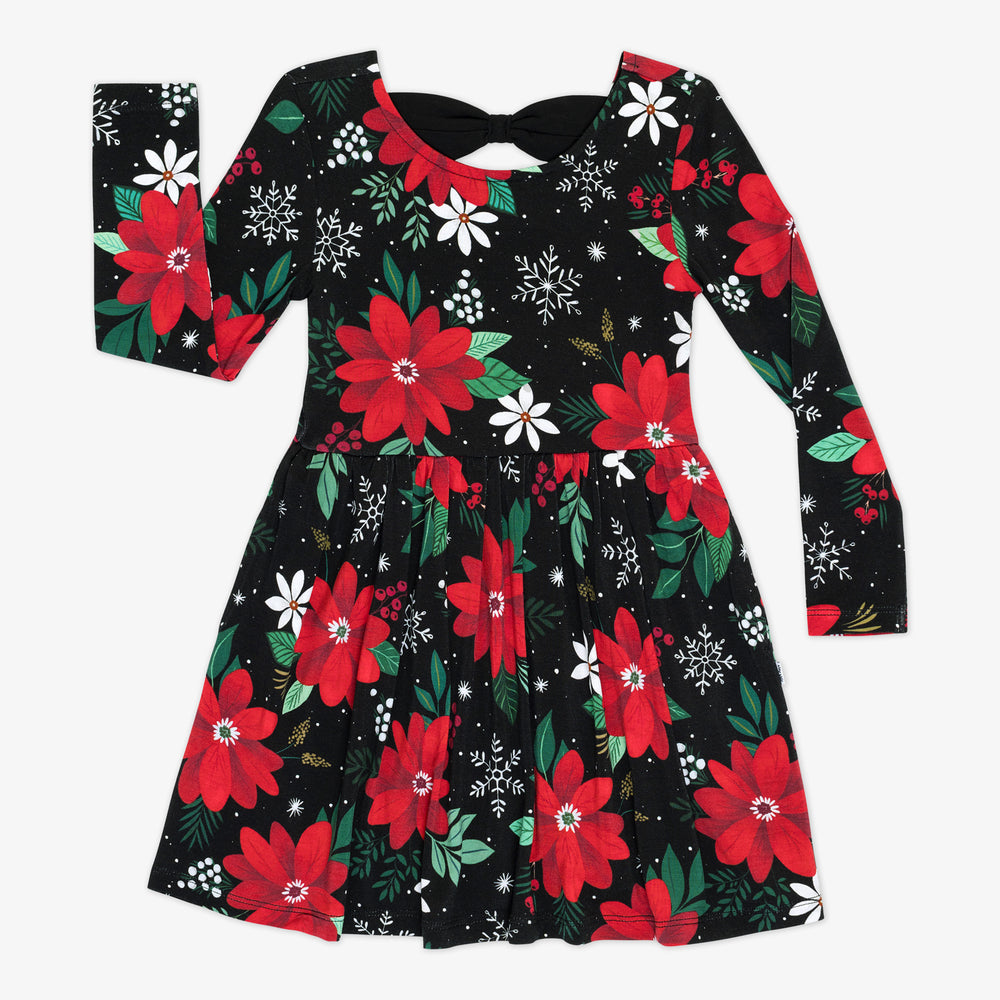 Flat lay image of a Snowy Blooms Bow Back Skater Dress