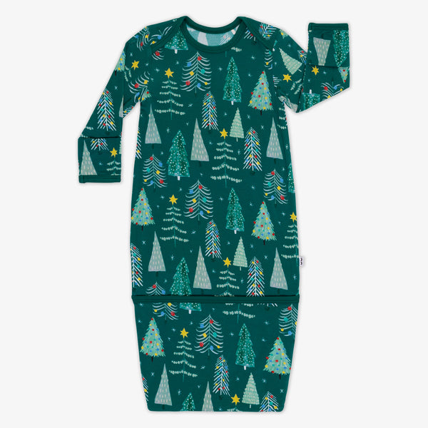 Flat lay image of the Green Twinkling Trees Infant Gown