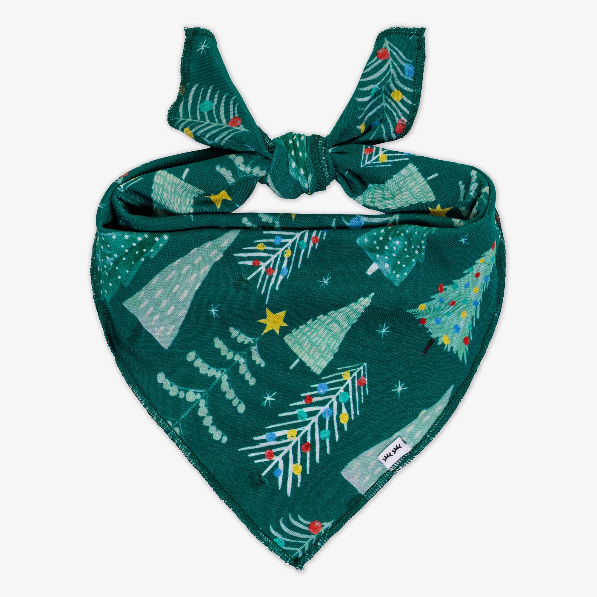 Flat lay image of the Green Twinkling Trees Pet Bandana