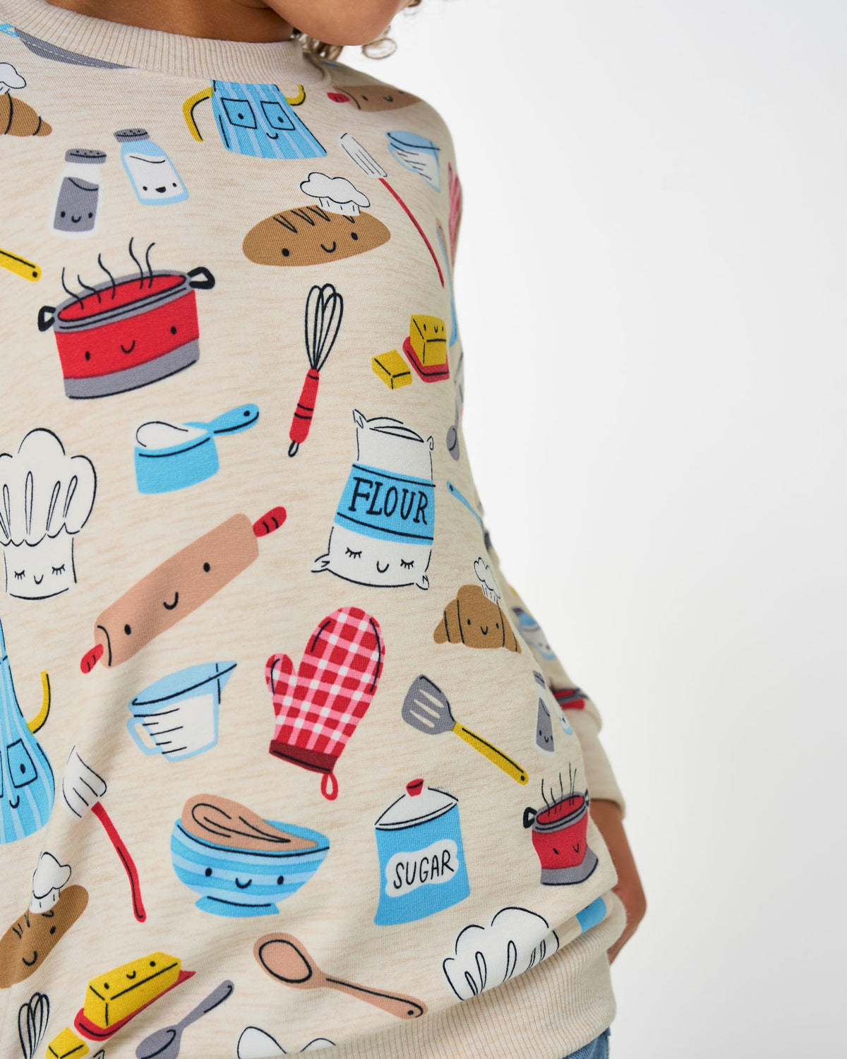 Close up of the food themed icons on the Little Chef Crewneck Sweatshirt