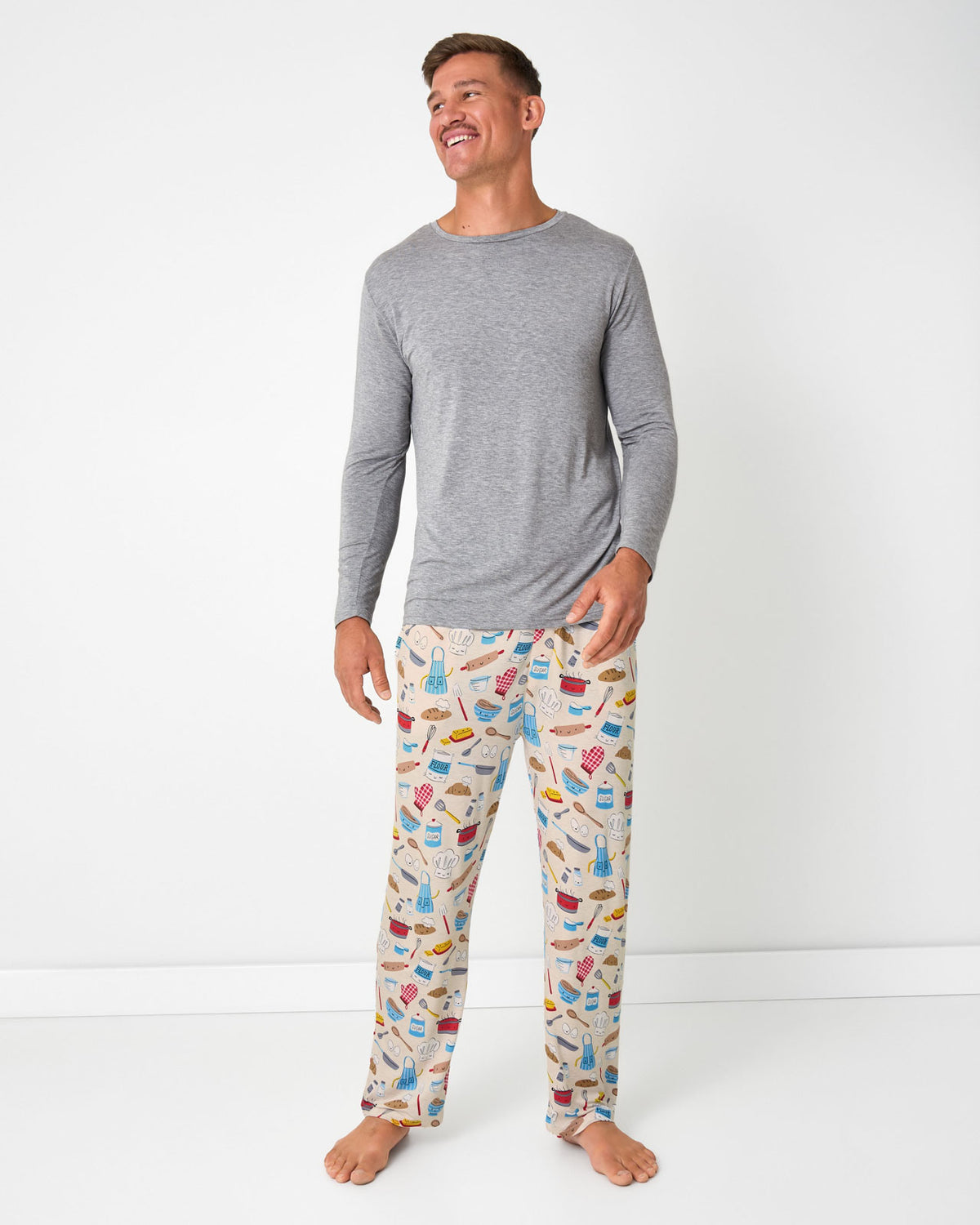 Man wearing the Little Chef Men's Pajama Pants with a gray pajama top