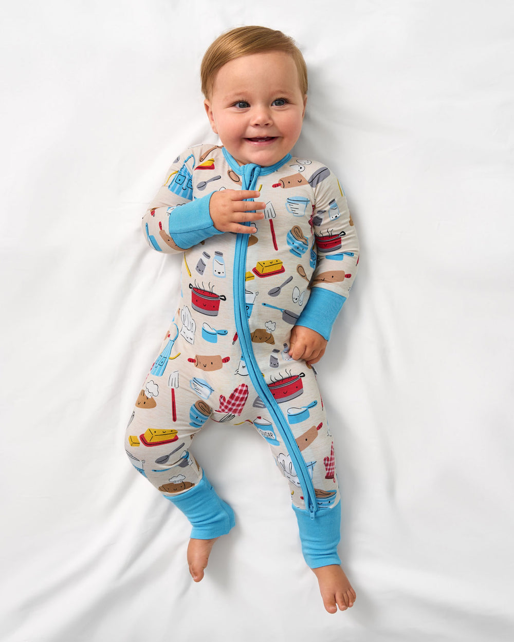 Aerial view of baby wearing the Little Chef Zippy