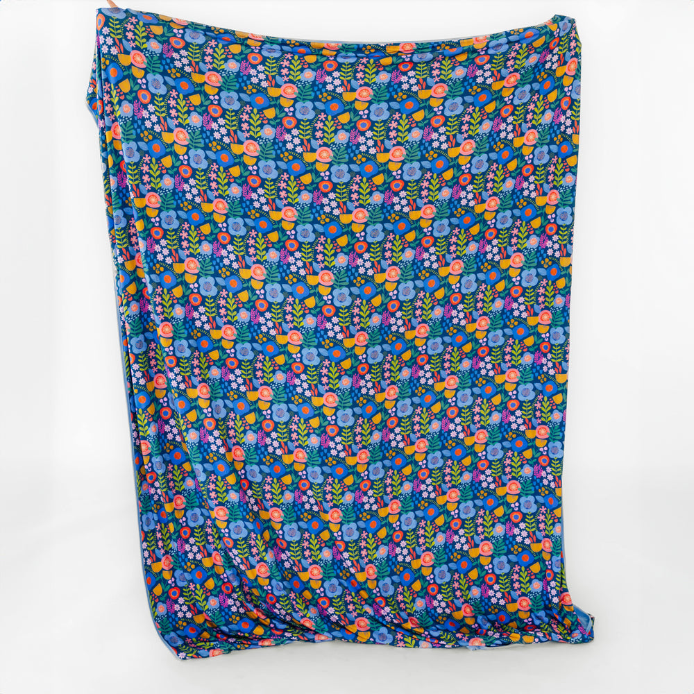 Front view of the Folk Floral Oversized Cloud Blanket®