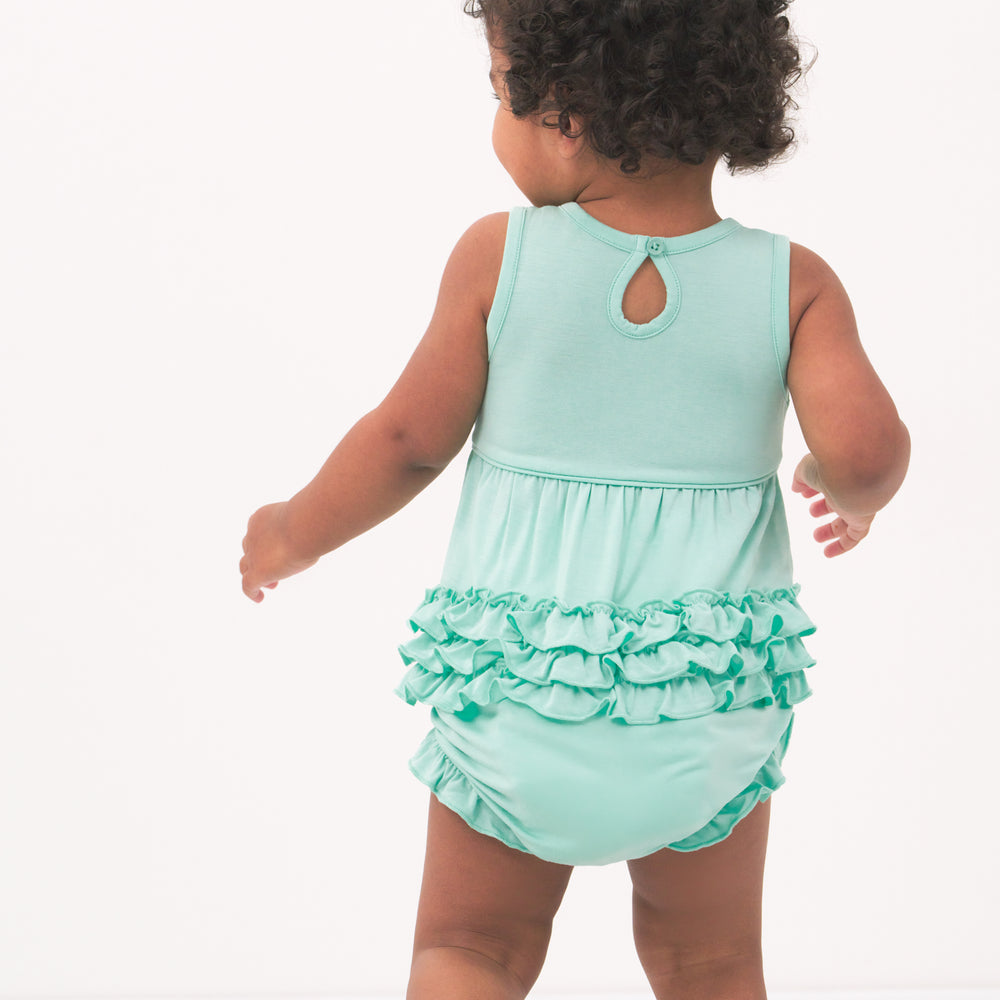 Back view image of a child wearing an Ocean Waves bubble romper