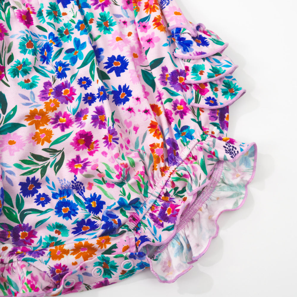 Close up detail shot of a Sweet Pea Floral Bubble Romper