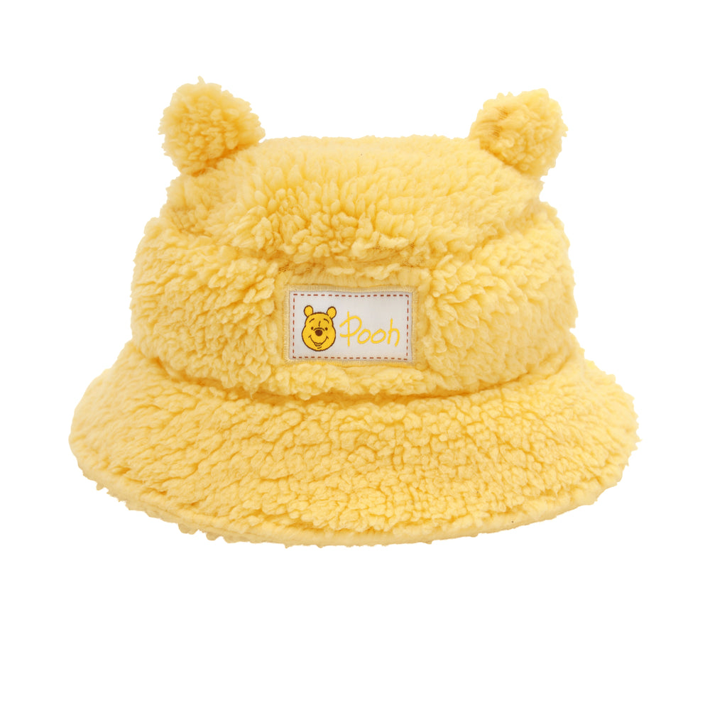 Click to see full screen - Flat lay image of a Disney Winnie the Pooh sherpa bucket hat
