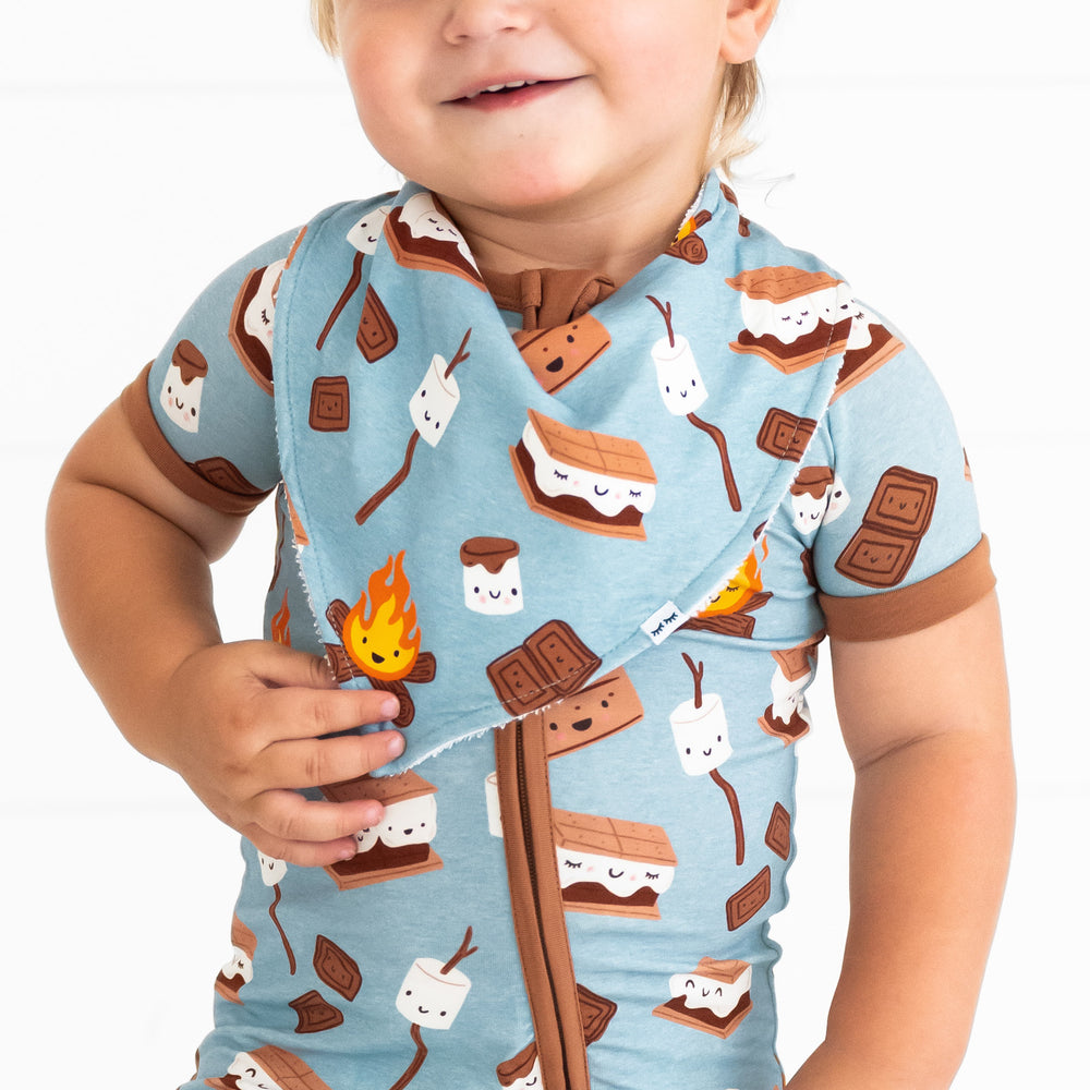 Alternate close up image of a child wearing a S'mores Galore bandana bib