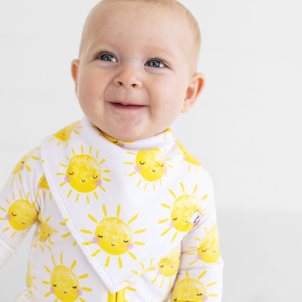 alternate close up image of a Sunshine printed bandana bib 