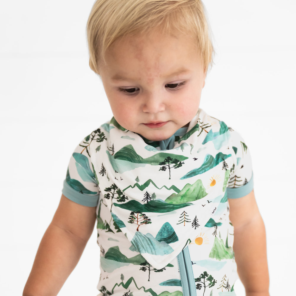 image of a child wearing a Mountain Mist bandana bib