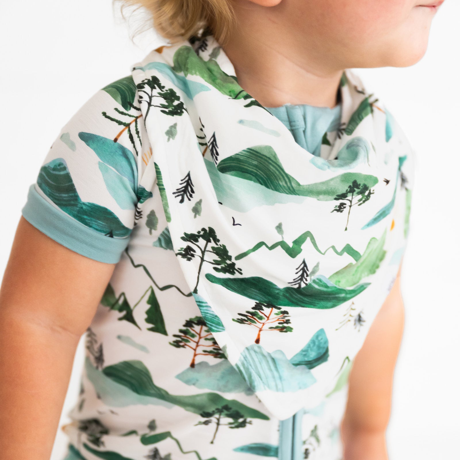 alternative close up image of a child wearing a Mountain Mist bandana bib