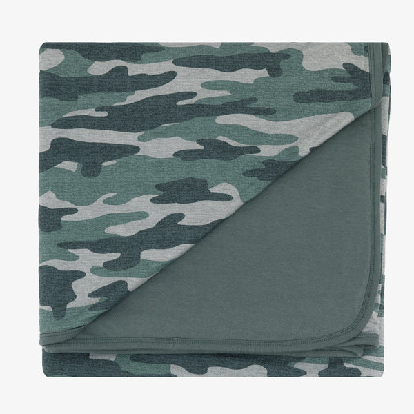 Flat lay image of the Vintage Camo Large Cloud Blanket® folded