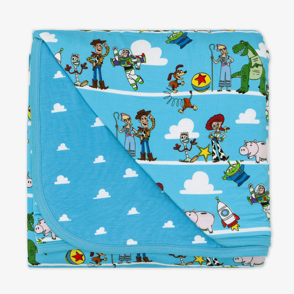 Flat lay image of a Disney Pixar Toy Story Pals large cloud blanket