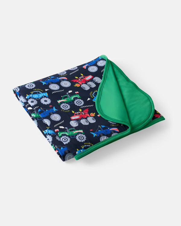 Flat lay of the Monster Truck Madness Large Cloud Blanket®