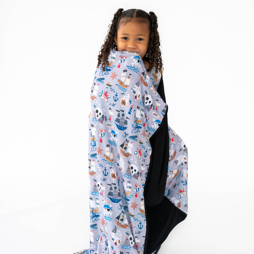 Girl wrapped in the Pirate's Map Large Cloud Blanket®