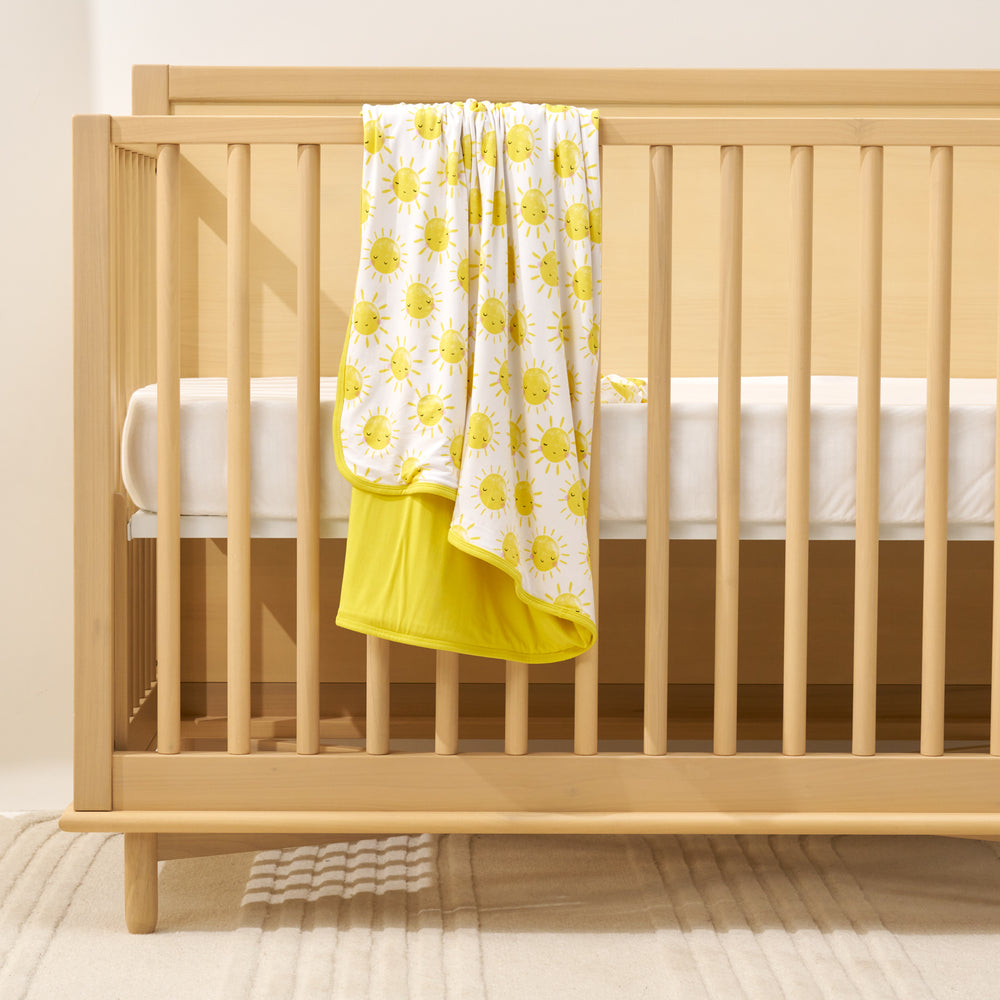 sunshine blanket over crib