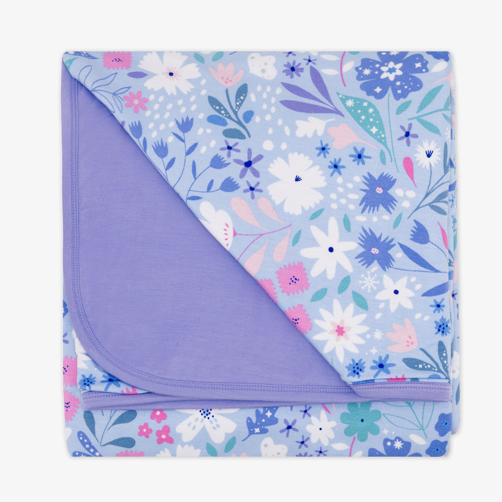 Flat lay image of a Magical Meadow showing a solid purple backing