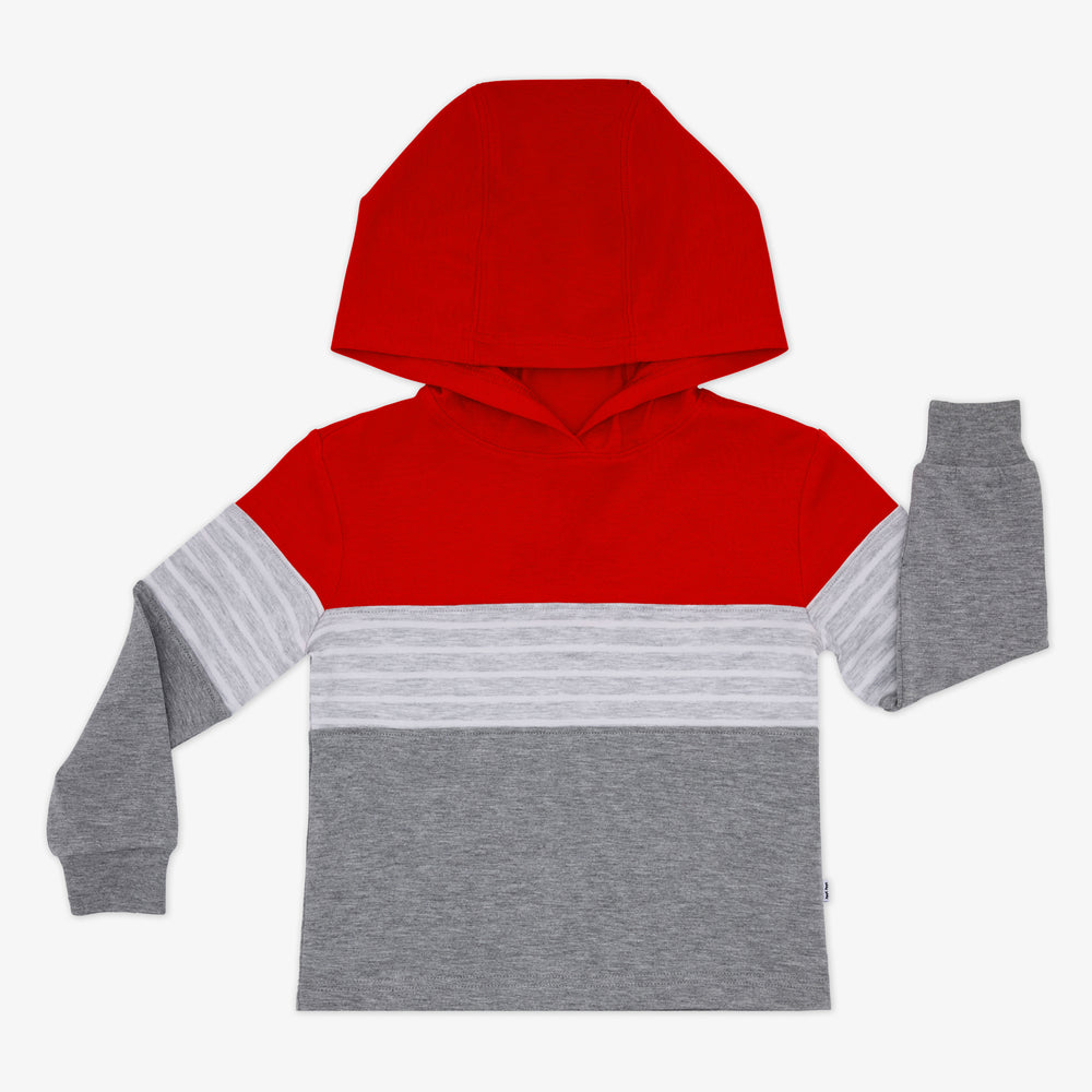 Flat lay of a Candy Red Colorblock Hooded Tee featuring a red top panel and hood, light heather gray stripes panel, heather gray panel, and long sleeves