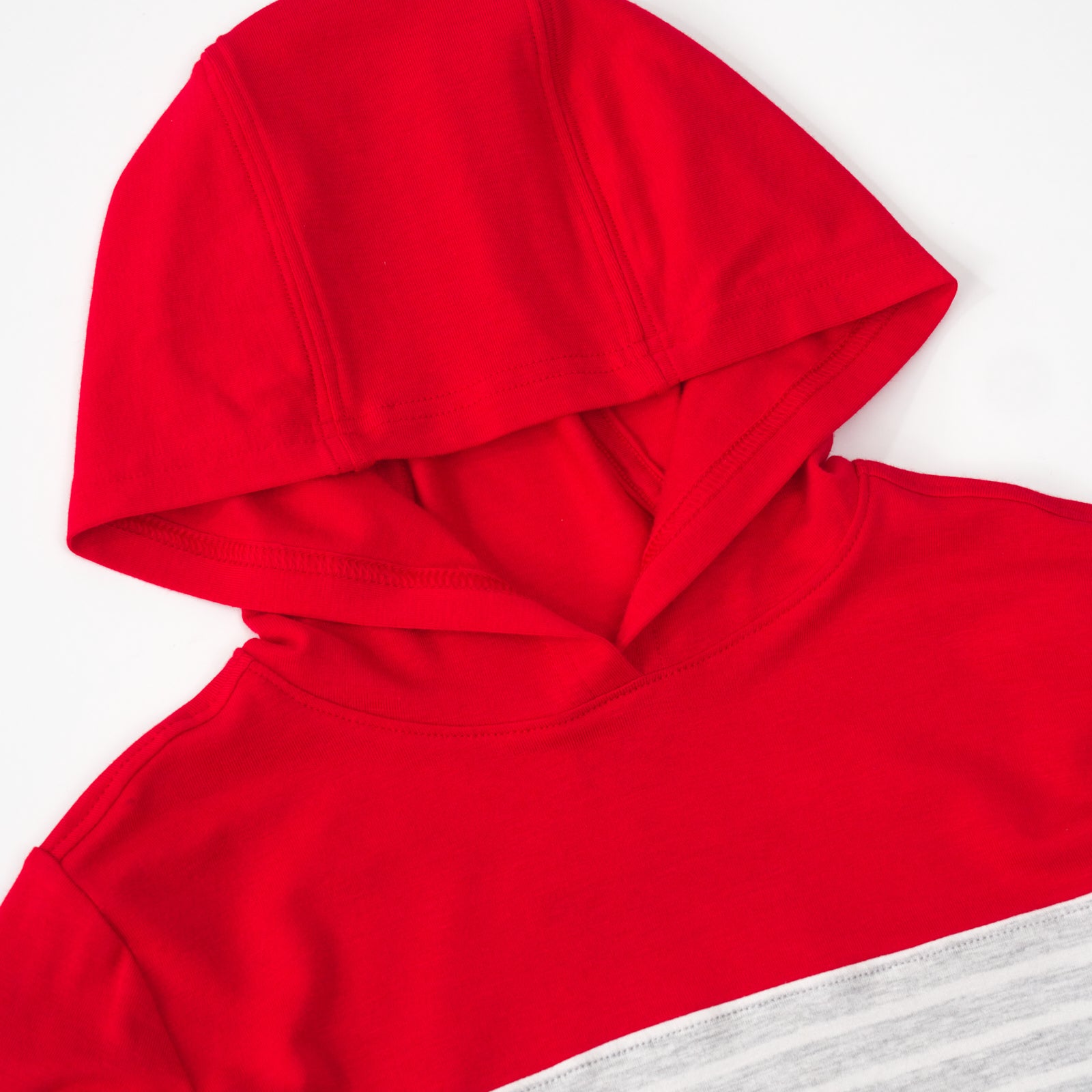 Close up flat lay of the hood on a Candy Red Colorblock Hooded Tee