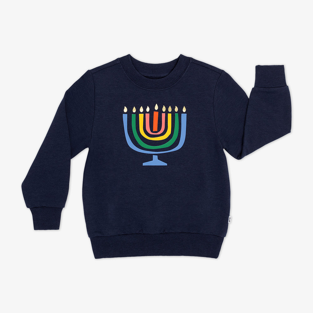 Flat lay image of a Menorah Graphic Crewneck