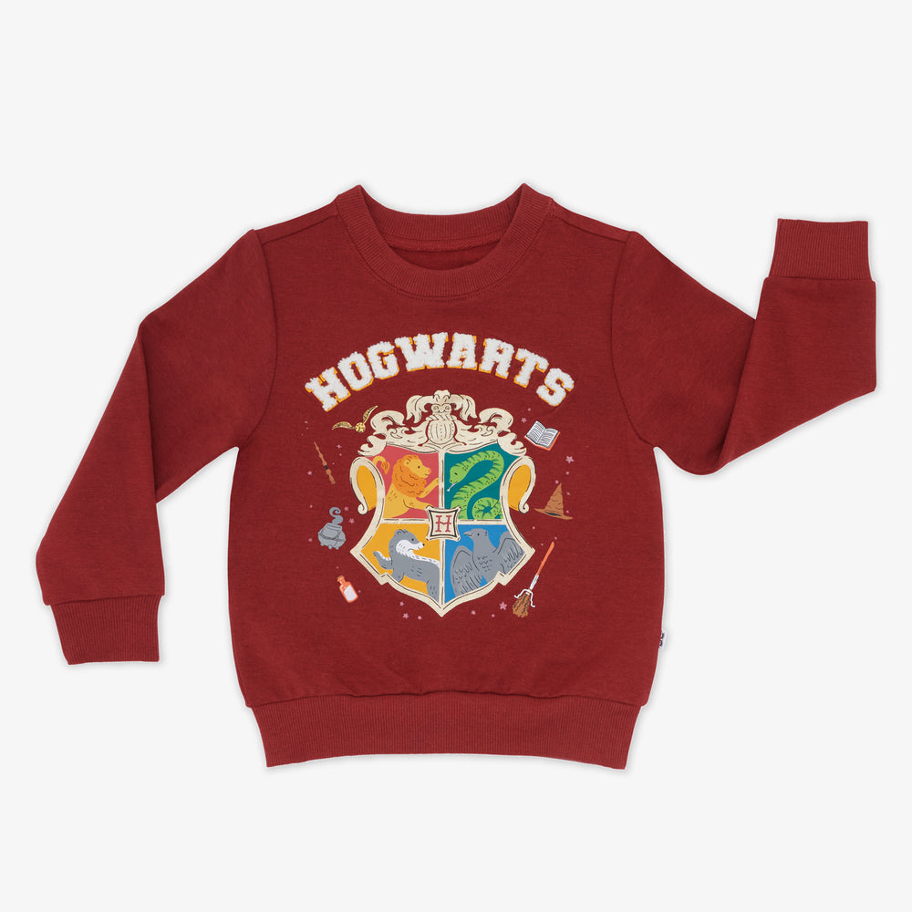 Flat lay image of a Hogwarts Crewneck Sweatshirt