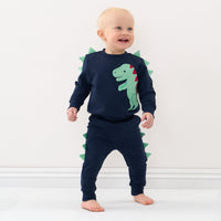 boy in matching dino top and jogger