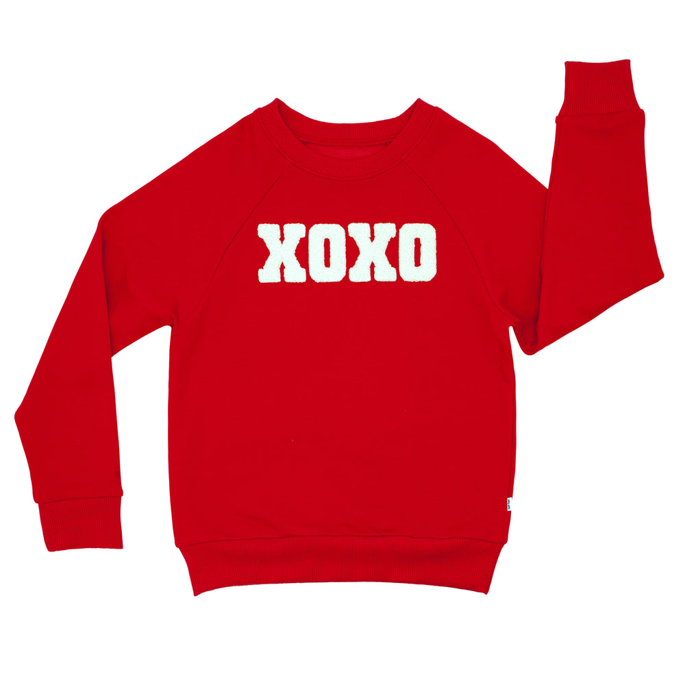 Click to see full screen - Flay lay image of a Candy Red crewneck sweatshirt