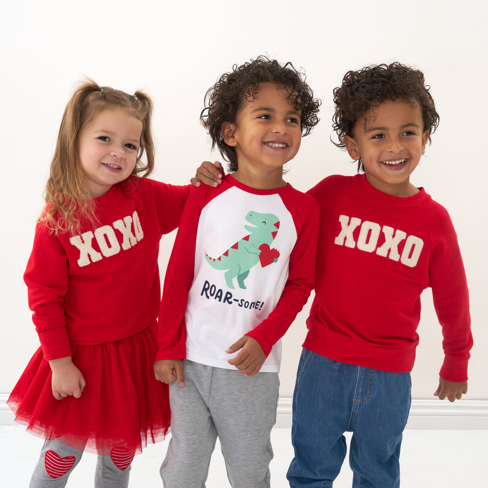 Click to see full screen - Three children wearing Valentine's Day Play by Little Sleepies outfits