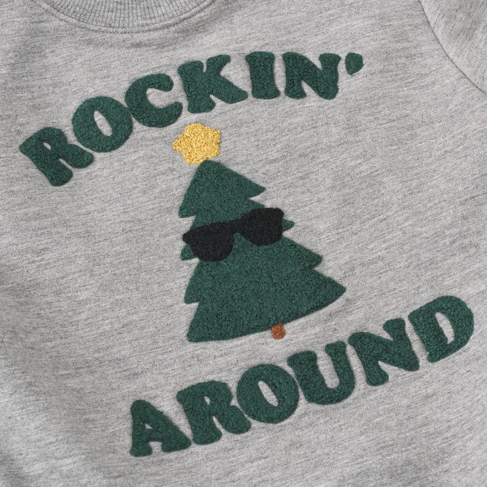 Close up detail shot of a Rockin' Around Crewneck Sweatshirt