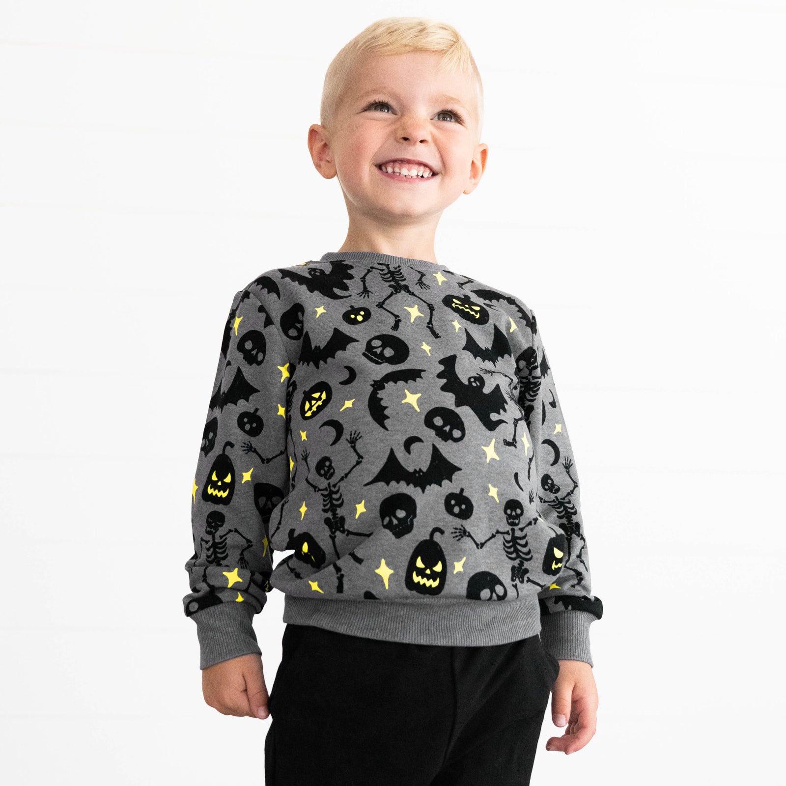 Boy wearing the Gray Glowing Ghouls Crewneck Sweatshirt