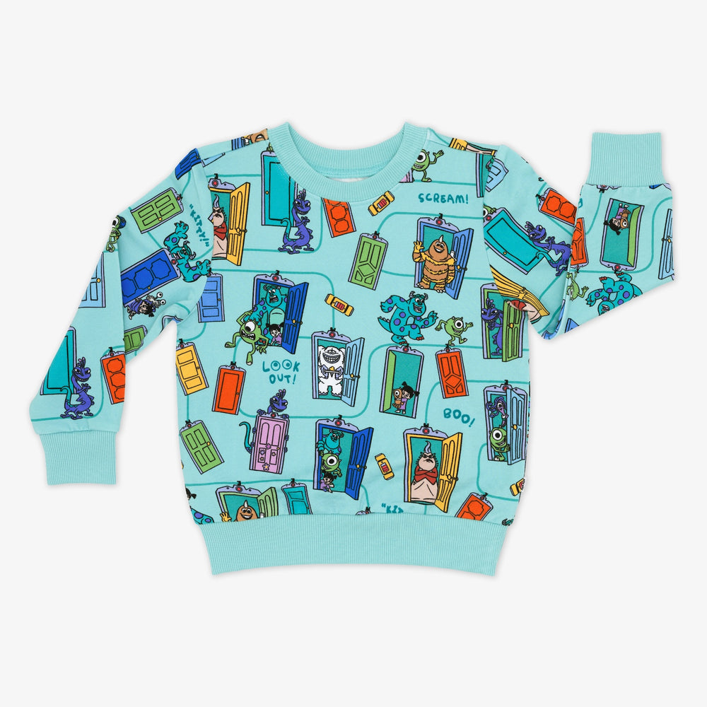 Flat lay image of a Disney Monsters, Inc. Scream Team Crewneck Sweatshirt