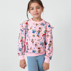 Child wearing a Disney & Pixar Toy Story Stars Flutter Crewneck and Light Blue Denim Jegging