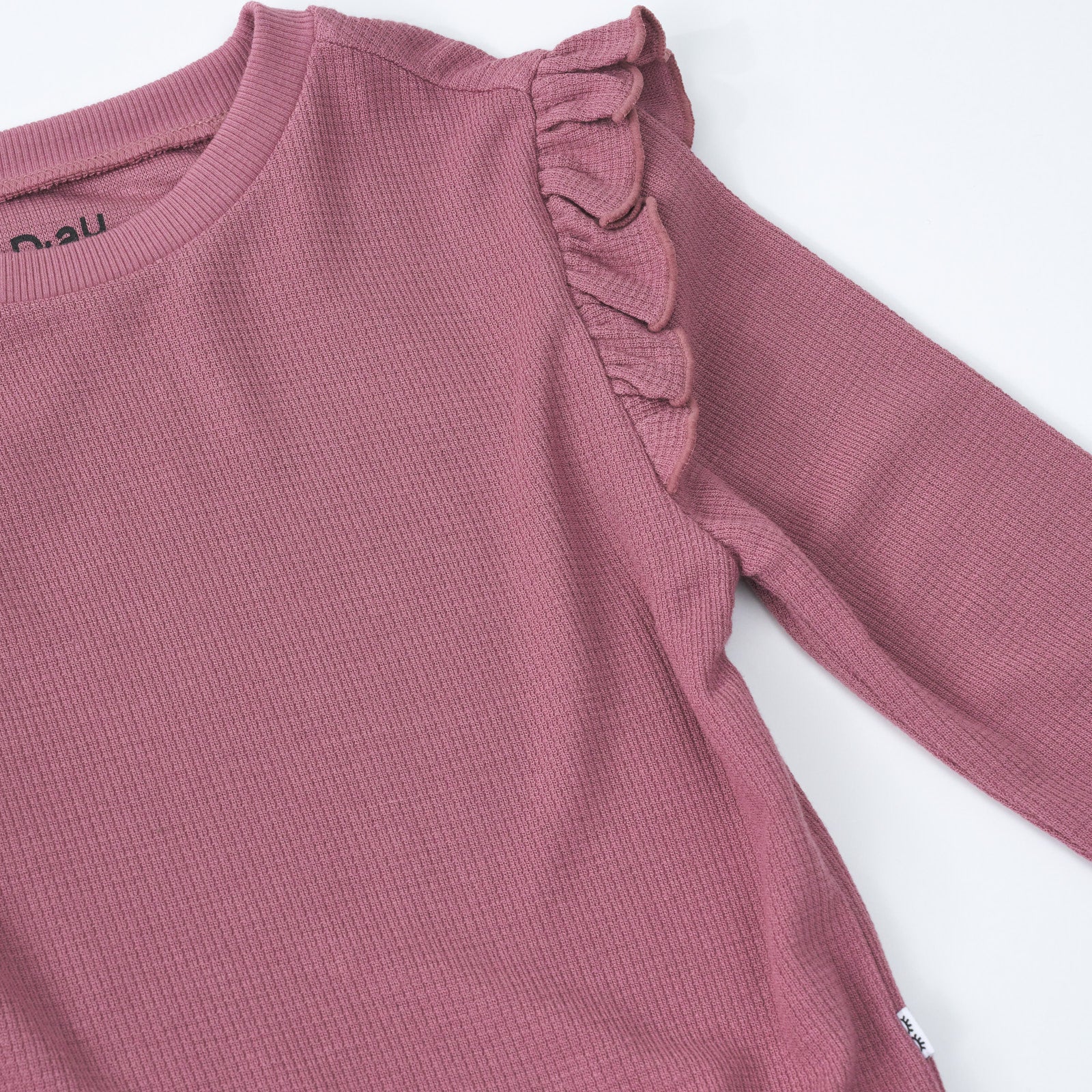 Alternate close up detail shot of a Dusty Plum Waffle Flutter Crewneck