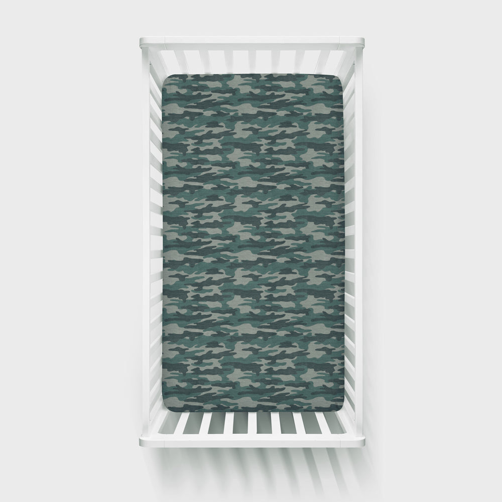 Top View of a vintage Camo Crib Sheet in a white crib