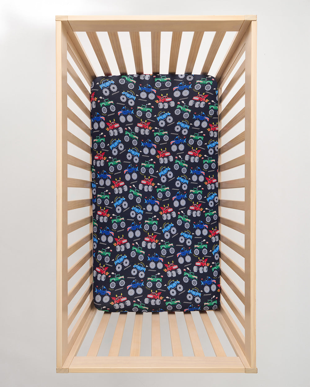 Aerial view of the Monster Truck Madness Fitted Crib Sheet