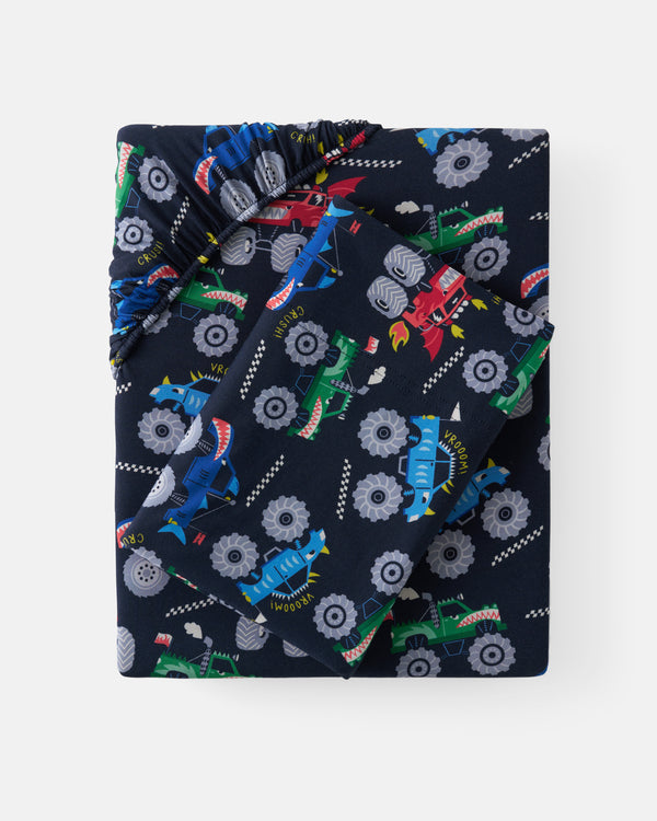 Flat lay of the Monster Truck Madness Two-Piece Pajama Set