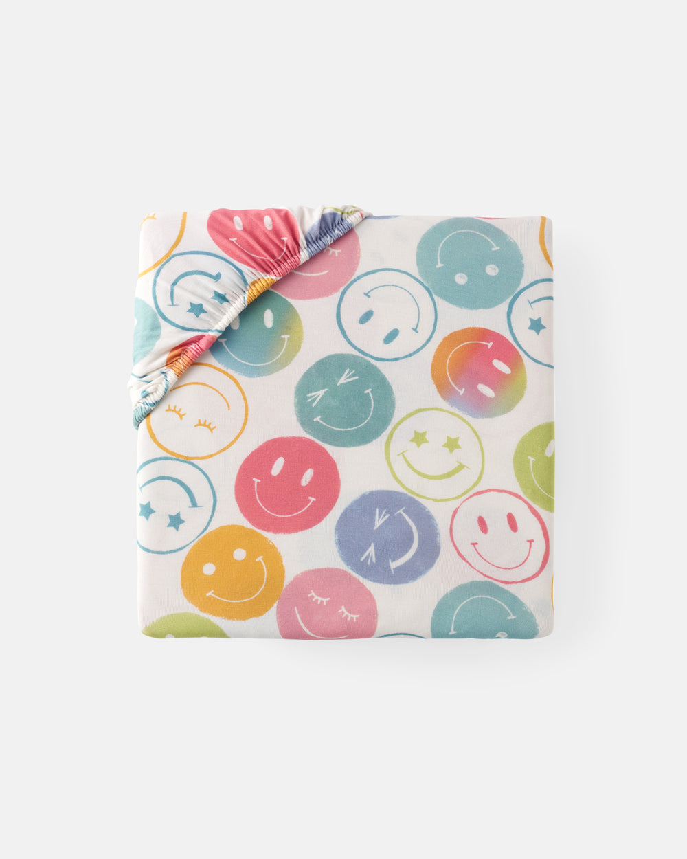 Flat lay of the miniPositive Vibes Fitted Crib Sheet