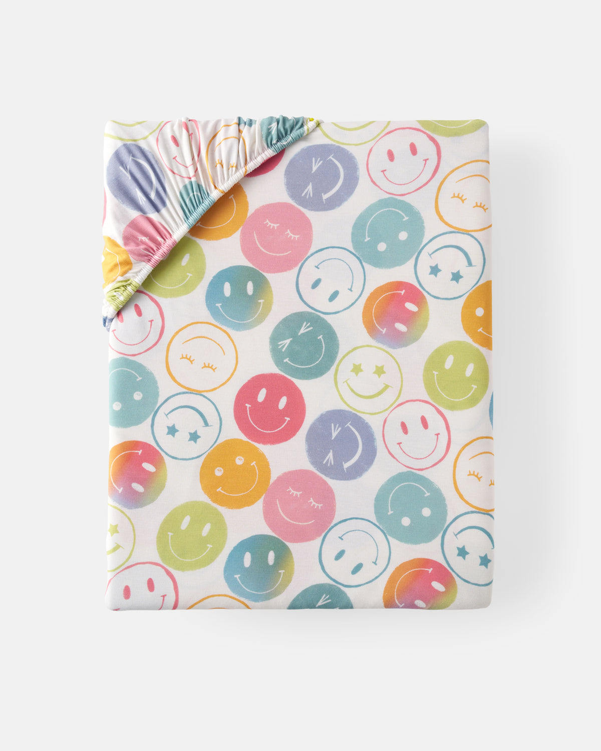 Flat lay of the standard Positive Vibes Fitted Crib Sheet