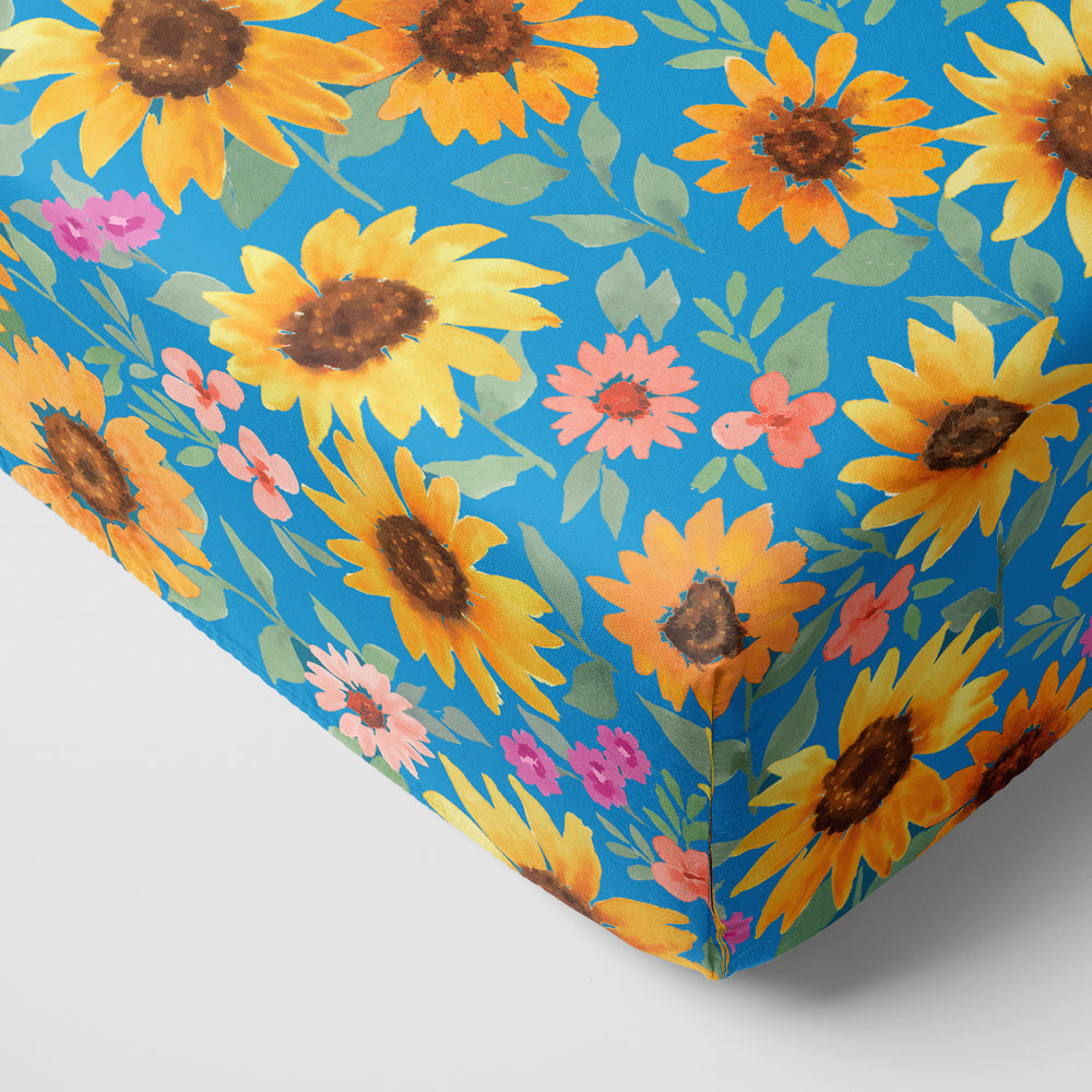 Corner image of the Sunflower Fields Fitted Crib Sheet