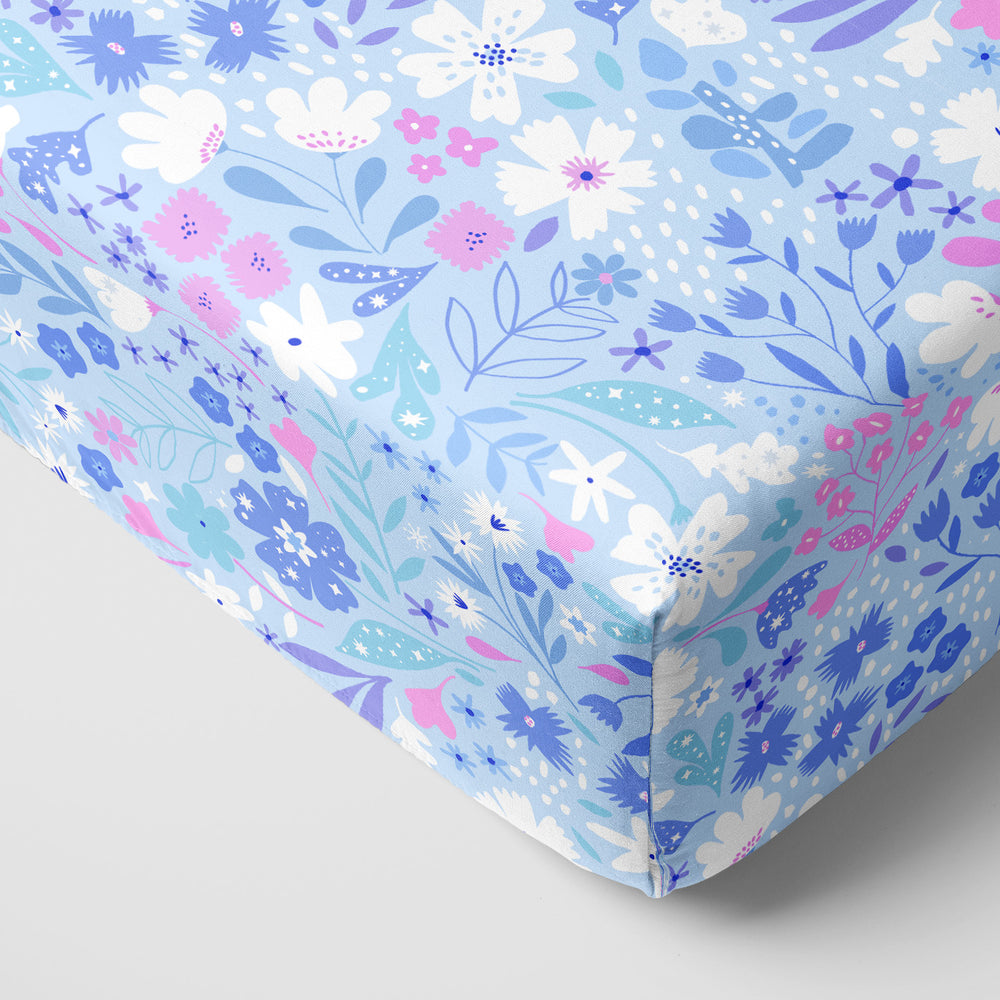 Corner image of a Magical Meadow crib sheet set